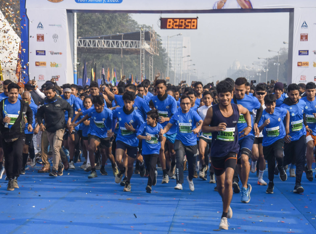 Runners begin a major road race in Delhi as hundreds participate in a large-scale marathon event.